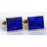 A PAIR OF LAPIS LAZULI CUFFLINKS each centred with a rectangular-shaped lapis lazuli panel