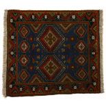 A YALAMEH RUG, SOUTH WEST PERSIA, MODERN the skyblue field with hooked diamond medallions in brown