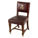 AN EDWARD VIII OAK PARLIAMENTARY CHAIR the padded close-nailed back and seat inscribed with the