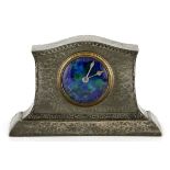 An Art Deco Liberty Style Clock a Tudric pewter mantel clock with copper and blue green dial,
