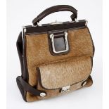 A GOLDPFEIL BUCK HIDE AND LEATHER HANDBAG Caramel colour hide and chocolate brown leather. Style