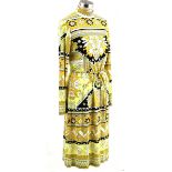 A LEONARD DRESS A graphic vintage dress in a yellow and black geometric print. It has long sleeves