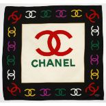 A CHANEL SILK SCARF Black border with multi-coloured logos. Excellent vintage condition.