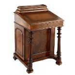 A VICTORIAN BURR-WALNUT DAVENPORT, 19TH CENTURY     the rectangular top with a gilt-tooled leather