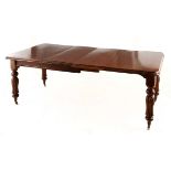 A WILLIAM IV MAHOGANY EXTENDING DINING TABLE the rectangular moulded top with rounded edges, on
