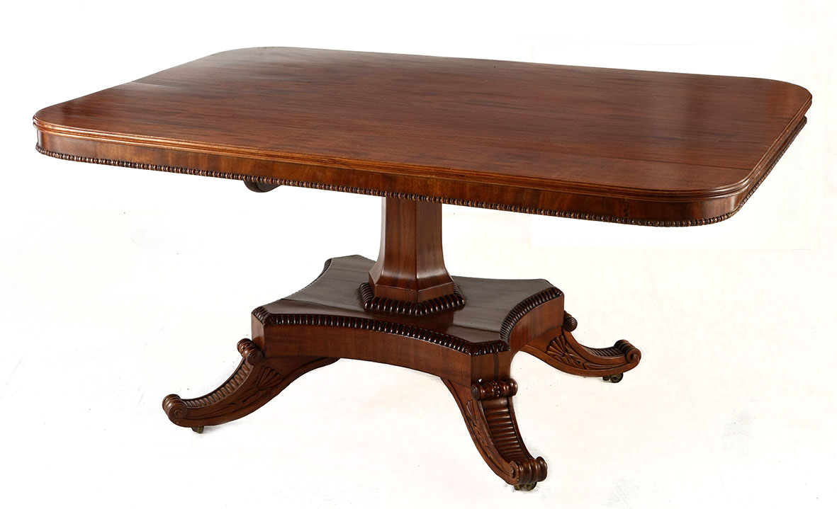 A WILLIAM IV FLAME MAHOGANY BREAKFAST TABLE the moulded rectangular top above a plain frieze with