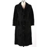 A FULL LENGTH SWAKARA COAT Lightweight vintage fur coat with a 70’s feel. Lined in beige suede