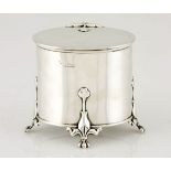 AN EDWARDIAN SILVER TEA CADDY, WILLIAM HUTTON & SONS, SHEFFIELD, the oval body highlighted with