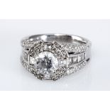 A DIAMOND RING claw-set to the centre with a round brilliant-cut diamond weighing approximately 1.