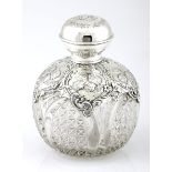 AN EDWARDIAN SILVER-MOUNTED SCENT BOTTLE, HENRY MATTHEWS, BIRMINGHAM, the glass circular body with