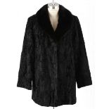 A SWAKARA COAT WITH BLACK MINK COLLAR Vintage fur jacket. Lined in satin. Side pockets edged in