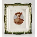 Anglo-Boer War China Wall Plaque No maker's mark, 1900 21 by 19cm. Central coloured portrait of Col.