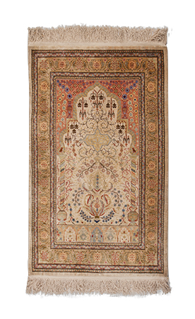 A HEREKE SILK PRAYER RUG, TURKEY, MODERN the ivory “mehrab” with a ascending tree design, twin