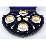 A CASED SET OF FOUR VICTORIAN SALT AND PEPPER POTS, FREDERICK ELKINGTON, BIRMINGHAM, each circular