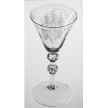 A DUTCH ENGRAVED 'VOC' DRINKING GLASS, 18TH CENTURY the funnel bowl later engraved with a three-