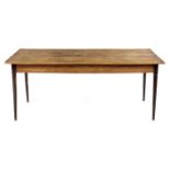 A CAPE STINKWOOD AND YELLOWWOOD TABLE, 19TH CENTURY the rectangular moulded top above a plain