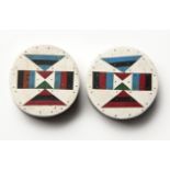 A PAIR OF ZULU WOOD AND VINYL EARPLUGS (2)