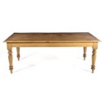 A CAPE YELLOWWOOD DINING TABLE, 20TH CENTURY the rectangular moulded top above a plain frieze, on