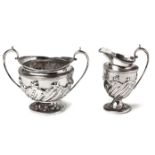 A VICTORIAN SILVER MILK JUG AND TWO-HANDLED SUGAR BASIN, CARRINGTON & CO, LONDON, 1891 AND 1892 each