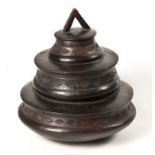 A LOZI FOOD VESSEL, ZAMBIA the three-tiered body with incised diamond-shaped designs 31cm high