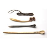 A MISCELLANEOUS COLLECTION OF FOUR ZULU SNUFF SPOONS comprising: two horn snuff spoons, one double