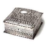 A VICTORIAN SILVER BOX, CHARLES EDWARDS, LONDON, 1894 the square body with a wavy rim, chased with