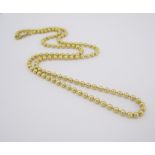 A BALL-LINK CHAIN NECKLACE impressed 750, Italian maker's stamp, approximately 50cm in length
