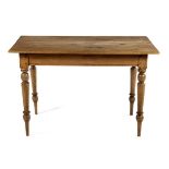 A CAPE YELLOWWOOD AND BOEKENHOUT TABLE, 19TH CENTURY the rectangular rounded top above a plain