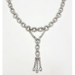 A DIAMOND NECKLACE designed as a series of oval and circular links, centred with a tassel motif,
