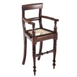 A CAPE STINKWOOD HIGH CHAIR, 19TH CENTURY the curved top rail above a conforming mid-rail, curved