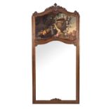 A FRENCH OAK PIER GLASS, 19TH CENTURY the arched plate within a conforming frame centred by a