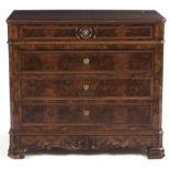 A FRENCH WALNUT-VENEERED CHEST OF DRAWERS the moulded rectangular top with canted corners above a