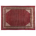 A MIR CARPET, WEST PERSIA ,MODERN the red field with an overall design of small botehs, ivory