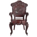 A JAPANESE EXPORT LACQUERED DRAGON ARMCHAIR, 20TH CENTURY the shaped back elaborately carved with