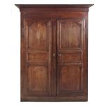 A FRENCH PROVENÇAL CHERRYWOOD AND OAK WARDROBE, 19TH CENTURY the later outswept cornice above a