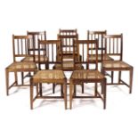 A SET OF EIGHT STINKWOOD OVERBERG STYLE CHAIRS, LAST QUARTER 20TH CENTURY each curved reeded top