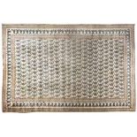 A KESHAN CARPET, PERSIA, MODERN the ivory field with diagonally arranged botehs depicted in pale