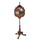 A VICTORIAN MAHOGANY AND TAPESTRY ADJUSTABLE FIRESCREEN the shaped tapestry within a conforming