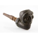 A YAKA PIPE, DEMOCRATIC REPUBLIC OF CONGO the bowl and stem carved with masks 18cm long