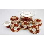 A SHELLEY MAROON AND GILT PART TEA SERVICE, 1925 - 1945 each with scroll panels enclosing