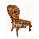 A VICTORIAN MAHOGANY UPHOLSTERED SIDE CHAIR the padded button-back within a conforming frame centred