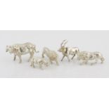 A SET OF FIVE FIGURES OF ANIMALS realistically modelled, comprising: a rhinoceros, a buffalo, a kudu