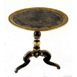 A JAPANNED TILT-TOP TABLE the circular top depicting hunting warriors in a landscape, above