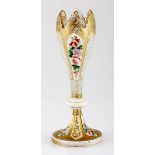 A BOHEMIAN WHITE OVERLAY AND GILT VASE, LATE 19TH CENTURY of tulip form, cut with panels of