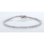 A DIAMOND TENNIS BRACELET claw-set with brilliant-cut diamonds weighing approximately 2.5cts in