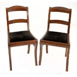 A SET OF SIX REGENCY STYLE MAHOGANY SIDE CHAIRS each curved and shaped top rail above a beaded and