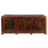 A CHINESE RED-LACQUER ELM AND PAINTED LOW CHEST the rectangular top with two hinged lids, each