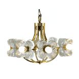 A MAZZEGA CLEAR GLASS AND BRASS EIGHT LIGHT FLOWER CHANDELIER, 1960's each flower-shaped shade