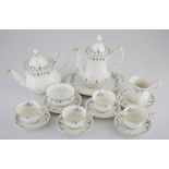 A ROYAL ALBERT 'MEMORY LANE' PART TEA SET, 1964 - 2009 each printed with a band of blue floral