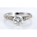 A SOLITAIRE DIAMOND RING claw set with a brilliant-cut diamond weighing approximately 0.85cts, the